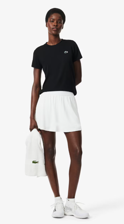 Laden Sie das Bild in Galerie -Viewer, T-SHIRT MULHER LACOSTE SLIM FIT COM TECNOLOGIA ULTRA-DRY PRETA

