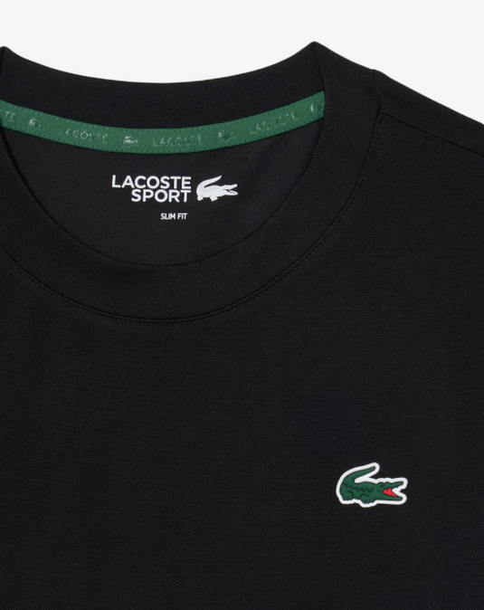 T-SHIRT MULHER LACOSTE SLIM FIT COM TECNOLOGIA ULTRA-DRY PRETA